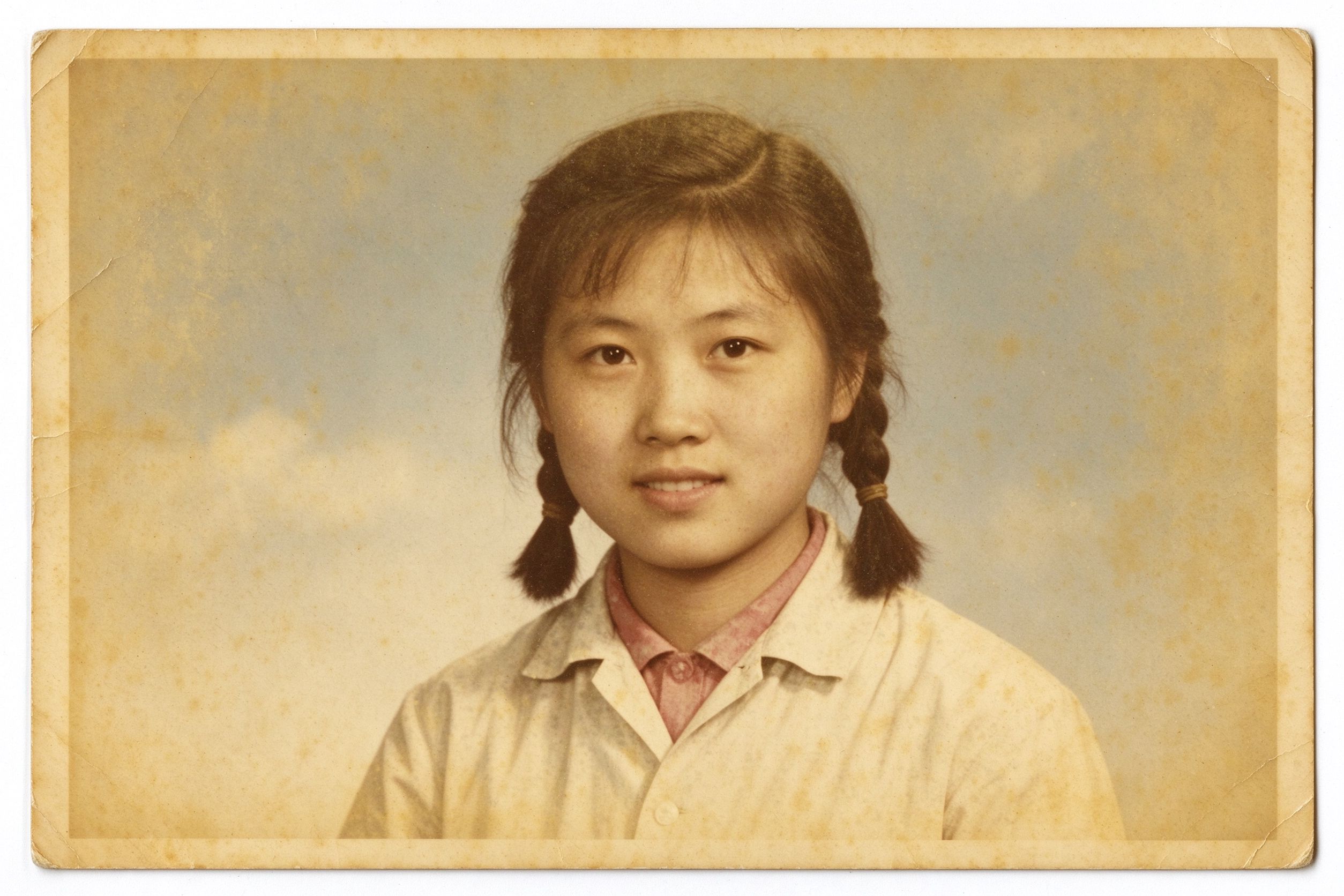 Faded yellowed old photograph